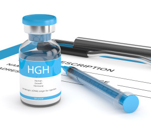 3d render of HGH vial with syringe on clipboard